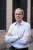 French economist Jean Tirole poses after a news conference at the Toulouse School of Economics in Toulouse